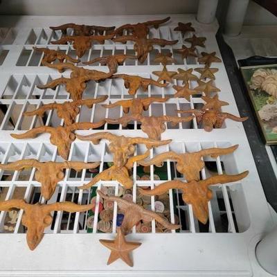 #2239 â€¢ (32) Bull Head and Star Metal Ornaments
