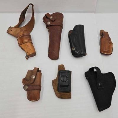 #1750 â€¢ (7) Pistol Holsters
