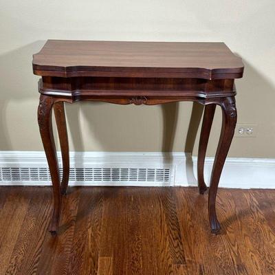 CONTEMPORARY CARVED INLAID GAMES TABLE | Opens on hinges to chess/checkers board. - l. 30.5 x w. 15.5 x h. 29.5 in

