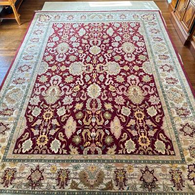 20TH C. OVERALL PATTERN CARPET | Wool with decorative patterns over a red ground, with abarsh. - l. 147 x w. 107 in

