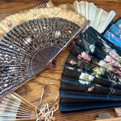 Several antique fans