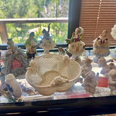 Old figurines, some from travel other inherited