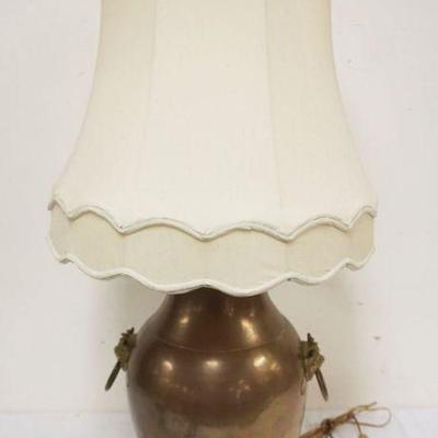 1197	LARGE COPPER & BRASS TABLE LAMP, URN SHAPED W/APPLIED FOO DOGS, APPROXIMATELY 38 IN HIGH
