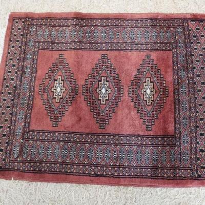 1290	WOOL HAND STICHED THROW RUG, APPROXIMATELY 27 IN X 35 IN
