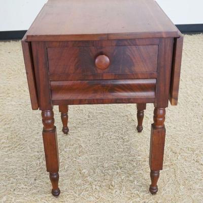 1243	ANTIQUE EMPIRE 2 DRAWER STAND WITH DROP LEAF SIDES, APPROXIMATELY 20 IN X 22 IN X 28 IN, EACH LEAF APPROXIMATELY 10 IN
