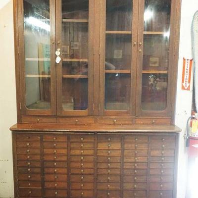 1235	ANTIQUE MAHOGANY COUNTRY 2 PIECE STORE APOTHECARY CABINET, TOP HAVING 4 GLASS DOORS & BASE HAVING 72 DRAWERS & 2 PULL OUT...