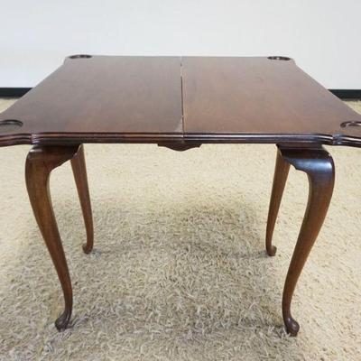 1220	MAHOGANY QUEEN ANNE STYLE CARD TABLE W/CABRIOLE LEGS & APPLIED SHELL CARVING, APPROXIMATELY 34 IN X 17 IN X 31 IN CLOSED, OPEN...