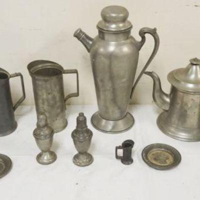 1119	GROUP OF ASSORTED PEWTER INCLUDING VASE, MEASURES, SALT & PEPPER, TEAPOT, LARGEST PIECE APPROXIMATELY 12 IN HIGH
