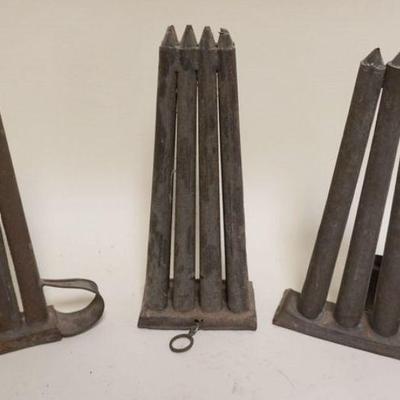 1204	ANTIQUE PRIMITIVE TIN CANDLE MOLD

