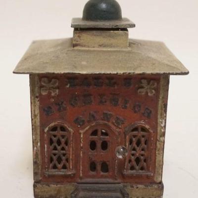 1200	ANTIQUE CAST IRON BANK, *HALL EXCELSIOR BANK* APPROXIMATELY 5 1/2 IN H
