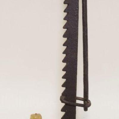 1252	PRIMITIVE WROUGHT IRON ADJUSTABLE CANDLE HOLDER
