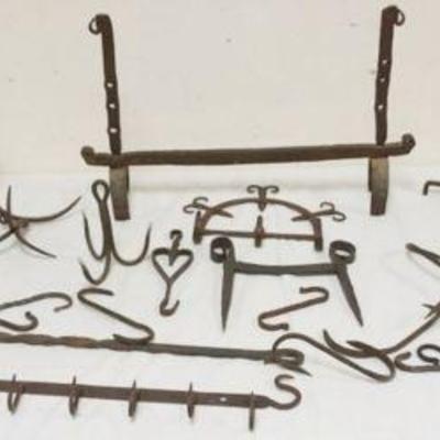1231	LARGE ASSORTMENT OF METAL FIREPLACE HOOKS 
