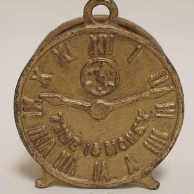1197	ANTIQUE CAST IRON STILL BANK, CLOCK, APPROXIMATELY 3 3/4 IN H *TIME IS MONEY*
