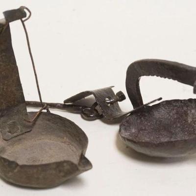 1207	2 ANTIQUE METAL BETTY LAMPS
