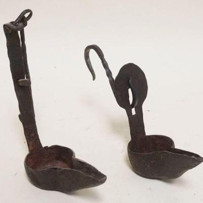 1206	2 ANTIQUE METAL BETTY LAMPS

