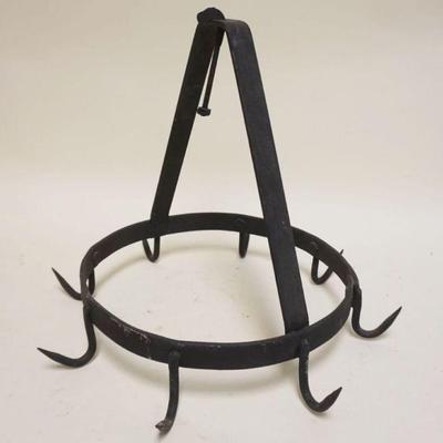1240	PRIMITIVE WROUGHT IRON FIREPLACE CIRCULAR GAME RACK
