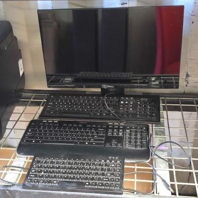 #4076 • Dell 23.5" Monitor and (3) Keyboards

