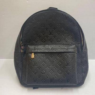 #1828 • Louis Vuitton Backpack
