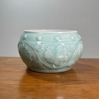ANTIQUE CHINESE CELADON PLANTER | Chinese glaze painted planter/vase with sculpted flower pattern, with underglaze blue marking on the...