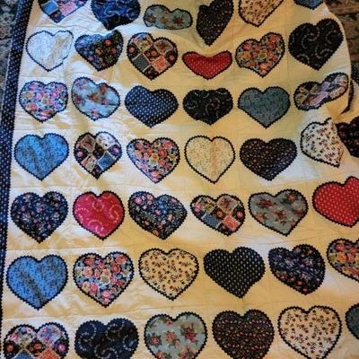 50" x 43" hand sewn heart quilt