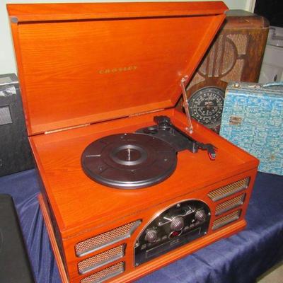 Combination turntable, receiver, cassette and CD player