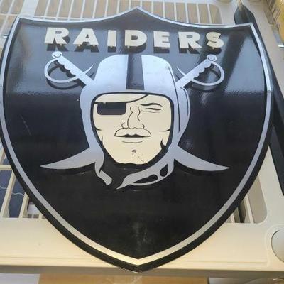 #10008 • Metal Raiders Sign
