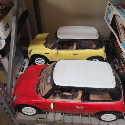 #1174 • (2) Mini Cooper RC Cars without Remotes

