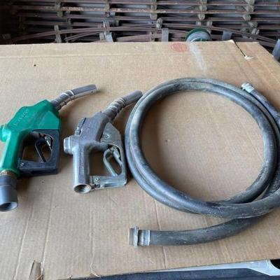 #6591 • Gas Pump Hose and Two Nozzles
