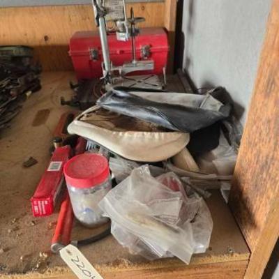 #22046 • Motorcycle seat covers, Toolbox, Press, Radiator.
