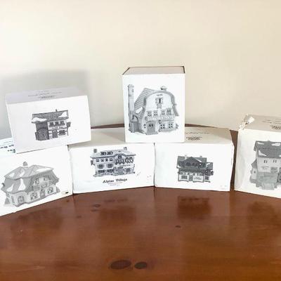 GRLI805 Heritage village Alpine Series	Collection of Christmas village display pieces. Includes six buildings in original packaging. 
