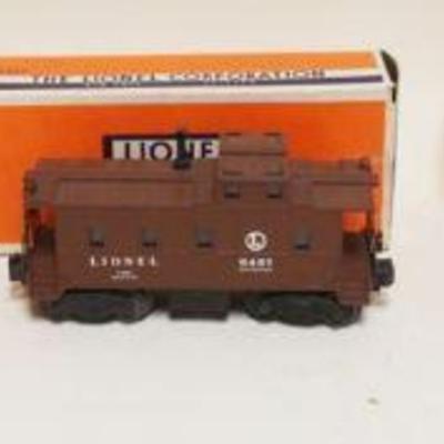 1285	LIONEL O GAUGE TRAIN NO 3484 OPERATING BOX CAR, NO 2465 TANK CAR, NO 6457 CABOOSE
