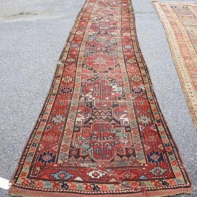 1218	ANTIQUE HAND WOVEN ORIENTAL RUNNER, APPROXIMATELY 3 FT 10 IN X 19 FT, WORN WITH RIPS
