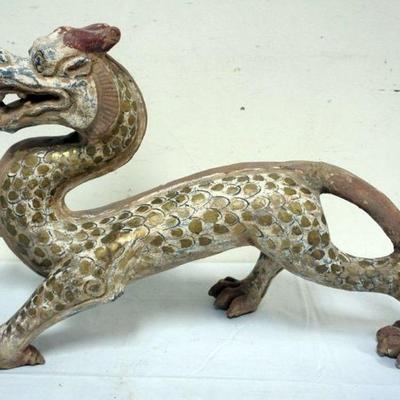 1162	CHINESE POLYCHROME DECORATED TERRACOTTA DRAGON, APPROXIMATELY 9 IN X 24 IN X 15 IN H
