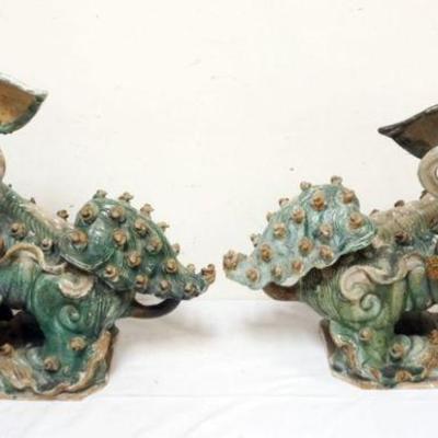 1204	PAIR OF LARGE CHINESE GLAZED TERRACOTTA FOO DOGS, EACH APPROXIMATELY 23 IN X 9 IN X 19 IN H
