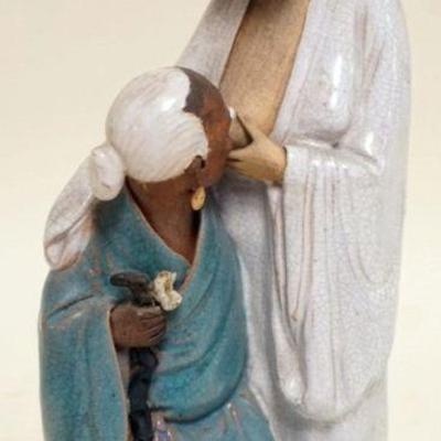 1227	CHINESE TERRACOTTA STATUE OF WOMAN BREAST FEEDING, APPROXIMATELY 10 IN H
