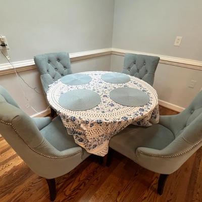 Round dining table & 4 upholstered chairs