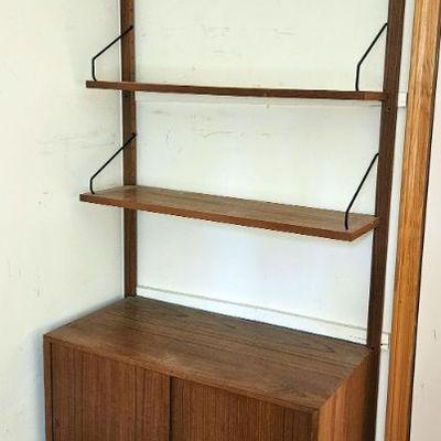 1178	MID CENTURY MODERN DANISH WALL SHELF WITH 3 SHELVES AND DOUBLE DOOR CABINET, APPROXIMATELY 33 IN X 17 IN X 78 IN H
