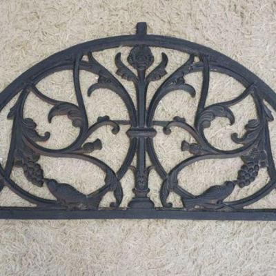 1231	CAST IRON ARCHITECTUAL GRATE WITH IMAGES OF BIRDS EATING GRAPES, APPROXIMATELY 41 IN X 21 IN

