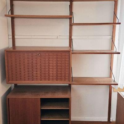 1181	DANISH MID CENTURY MODERN ADJUSTABLE WALL UNIT WITH 6 SHELVES AND 2 DOOR CABINET AND FALL FRONT CABINET WITH BASKET WOVEN DESIGN,...