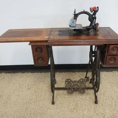 1175	ANTIQUE WILCOX & GIBBS TREADLE SEWING MACHINE
