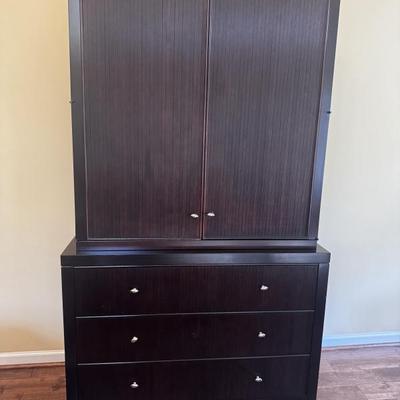 Barbara Barry for Baker Furniture Reed Armoire Optimized for a television in the cabinet. Comes with two adjustable shelves and...