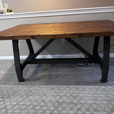 Bring farmhouse style to your home with this INK+IVY Lancaster Dining Table.

PRODUCT FEATURES
Rivet detail
Metal finished wood leg
For...