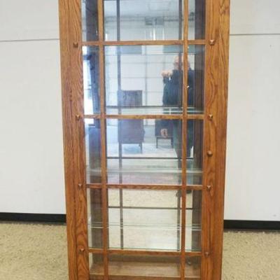 1169	PHILIP REINISCH MISSION OAK STYLE CRYSTAL CABINET WITH LATICE WORK DOOR, MIRROR BCK AND INTERIOR LIGHTS AND 4 ADJUSTABLE SHELVES,...