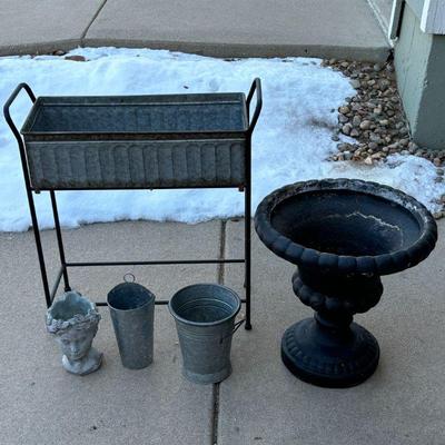 Lot #184 - Galvanized Steel Planter, Black Urn Planter, 2 Small Metal Planters & Cement Classic Greek Lady Head Planter