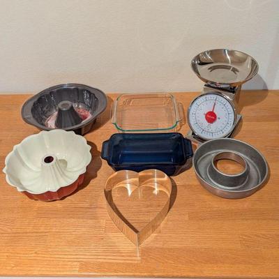 Lot #139 - Baking and Kitchen Tools Lot - Bundt Pans, Glass Bakeware, Heart Shaped Mold & More.