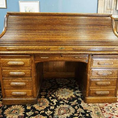 1106	OAK ROLL TOP DESK, QUARTER SAWN OAK, APPROXIMATELY 66 IN X 36 IN X 50 IN HIGH
