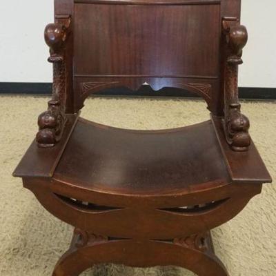 1135	MAHOGANY CARVED SAVONAROLA CHAIR W/CARVED SWANS SIDES, APPROXIMATELY 27 IN X 23 IN X 39 IN HIGH
