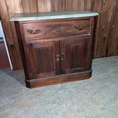 Marble topped side board