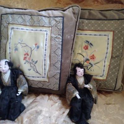 Antique asain dolls and needlepoint on silk old pillows