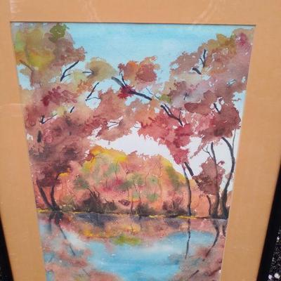Signed and framed in wood frame under glass water color